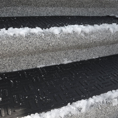 Snow melting mat installation on residential walkway