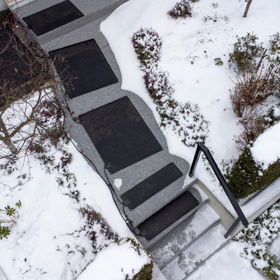 Hot Step heated mat keeping pathways clear in heavy snow