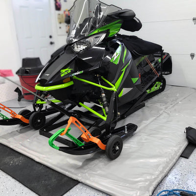 Garage containment mat for snowblower - protects garage floor from snow and salt